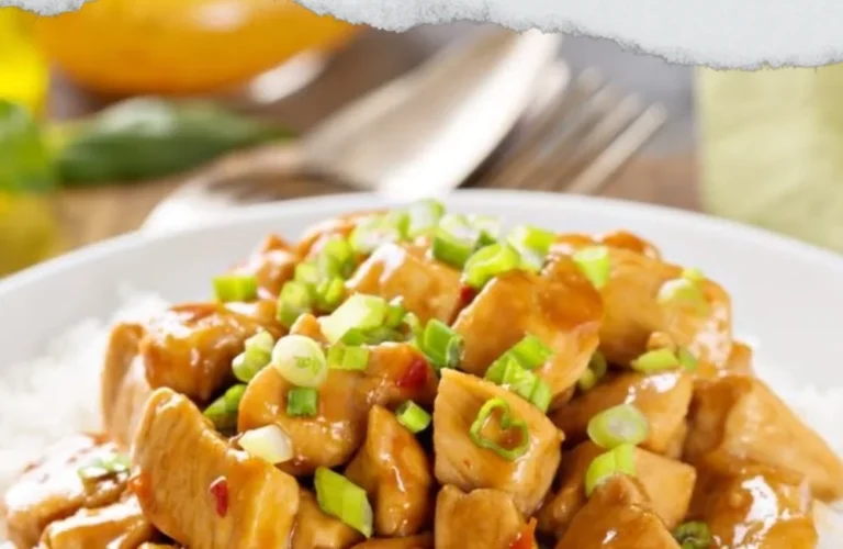 Healthier sweet and sour chicken served with vegetables on a plate