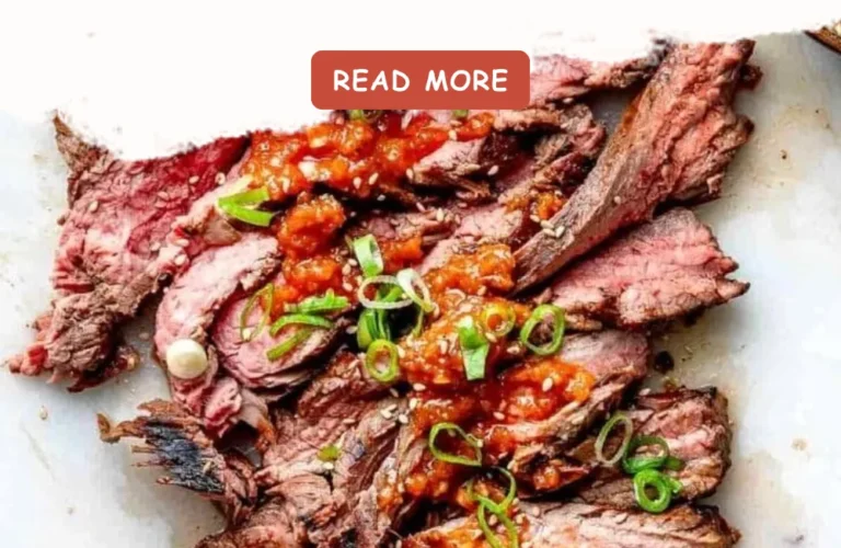 Korean flank steak marinated and grilled to perfection, garnished with sesame seeds.