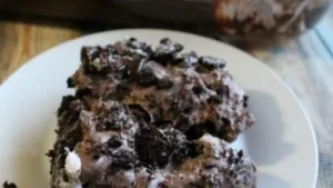 Delicious Oreo Dirt Pie dessert topped with crushed Oreos and chocolate pudding
