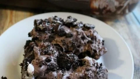 Delicious Oreo Dirt Pie dessert topped with crushed Oreos and chocolate pudding